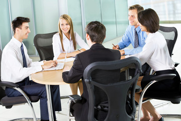 Businesspeople working at meeting