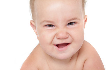 studio close up portrait of baby isolated over white