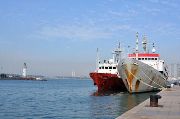 The ship docked at the pier