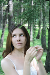 Young woman in a summer park