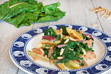 fresh salad with chard noodles and pine nuts