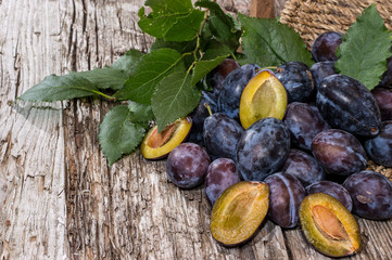 Basket with a heap of Plums