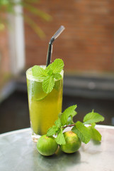 mint smoothie with lime in glass