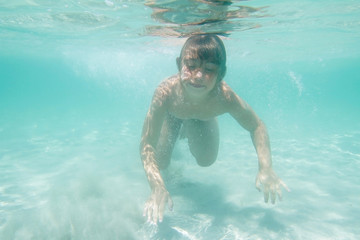 young child girl underwater