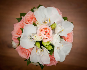 Gold wedding rings on flower