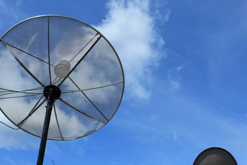 Satellite dish antennas under sky