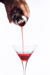 barman's hand with shaker liquor