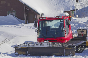 A snow groomer ready to use