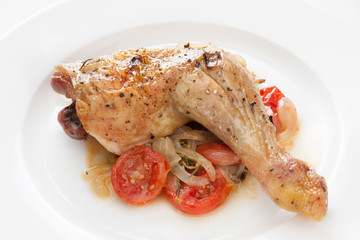 Roast chicken with tomatoes, onions and herbs
