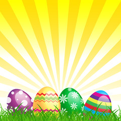 Colorful Easter eggs decorated in the grass