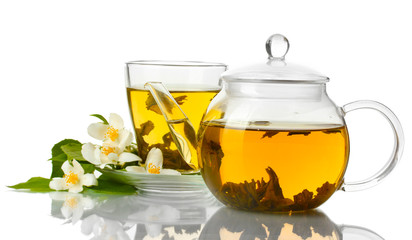 green tea with jasmine in cup and teapot isolated on white