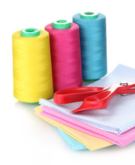 Sewing accessories and fabric isolated on white