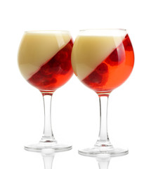 fruit jelly with raspberries in glasses isolated on white