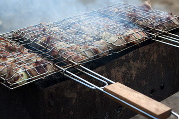 Chicken barbecue on grill.