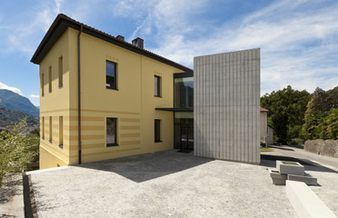 Fototapeta premium view of the yellow house from the square