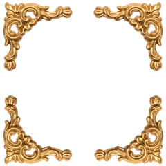 golden elements of carved frame on white