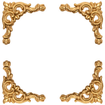 golden elements of carved frame on white