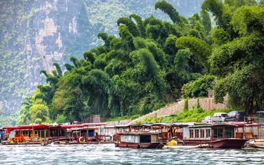Foto auf Glas Bootfahren auf dem Fluss Guilin © rigamondis
