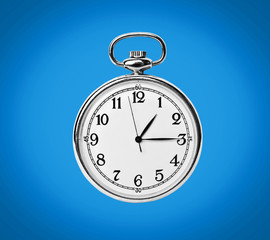 Clock isolated on blue background