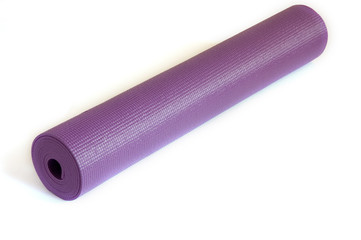 Rolled up yoga mat isolated on white