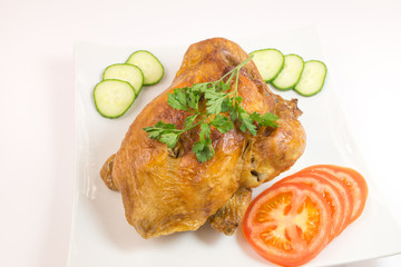 Grilled chicken and vegetable on white