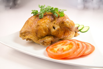 Grilled chicken and vegetable on white