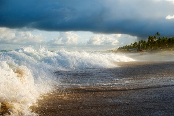 Breaking waves at sunset along Brazilian Beach