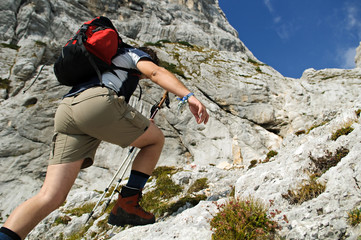 Mountaineer climbing up the mountain