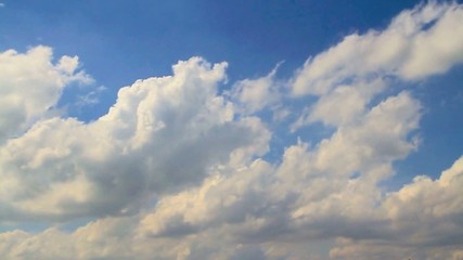 Accelerated blue fluffy cloudscape
