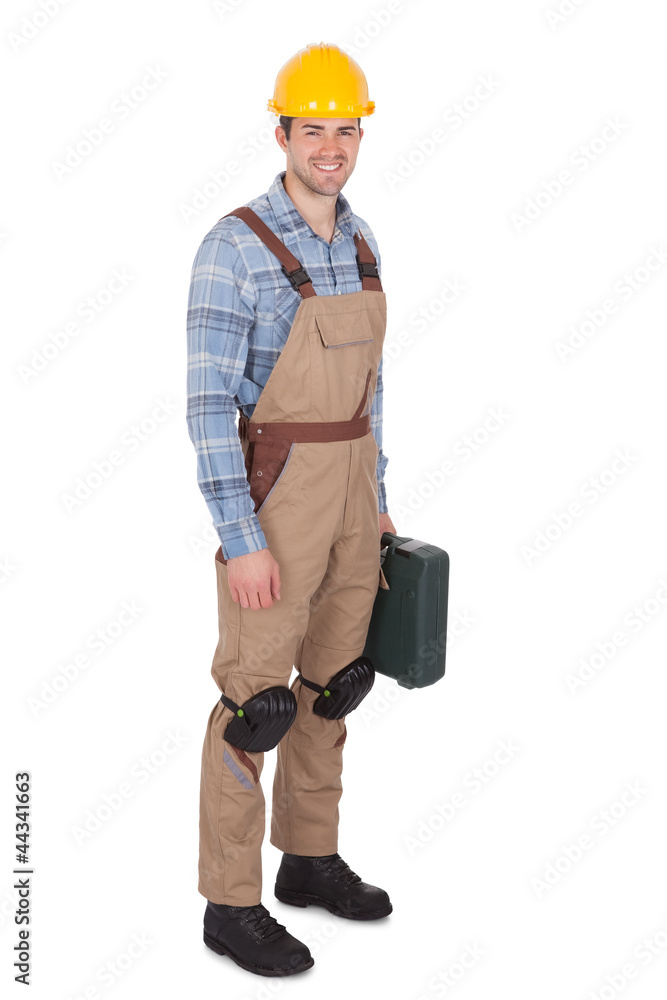 Wall mural worker wearing hard hat