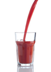 Tomato juice splash in a glass
