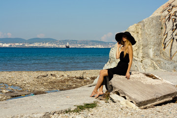 beautiful young woman near the sea