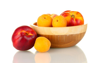 Fototapeta na wymiar Ripe fruit in bowl isolated on white