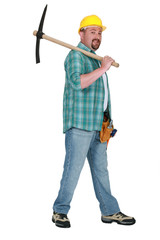 Man resting pick-axe over his shoulder