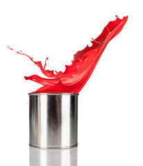 Red paint splashing out of can, isolated on white background