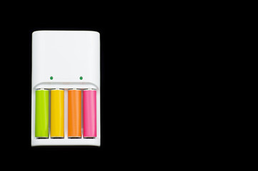 colorful rechargable batteries on a white charger