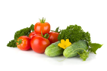 Ripe tomatoes, cucumbers and parsley
