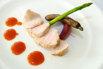 Grilled Chicken breast decorated on white dish