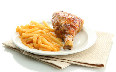 Roast chicken with french fries on plate, isolated on white