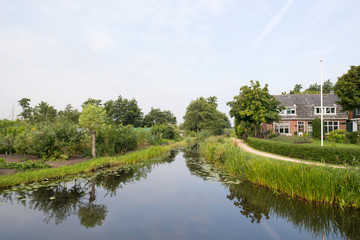 Fototapeta na wymiar Ditch in Dutch landscape