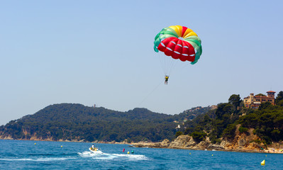 parasailing and boat