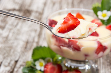 Big bowl with Pudding on wood