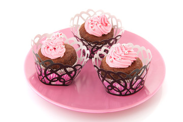 Chocolate cupcakes with pink