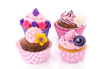 Four colorful cupcakes