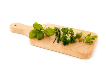 Cutting board with fresh herbs