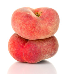 ripe fig peaches isolated on white.