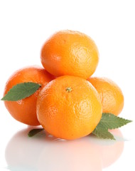 ripe tangerines with leaves isolated on white