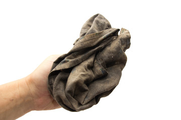 dirty rag in his hand on a white background