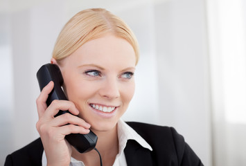 Beautiful businesswomen talking on the phone