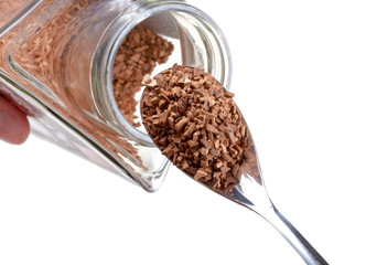 spoon in glass pot with instant coffee